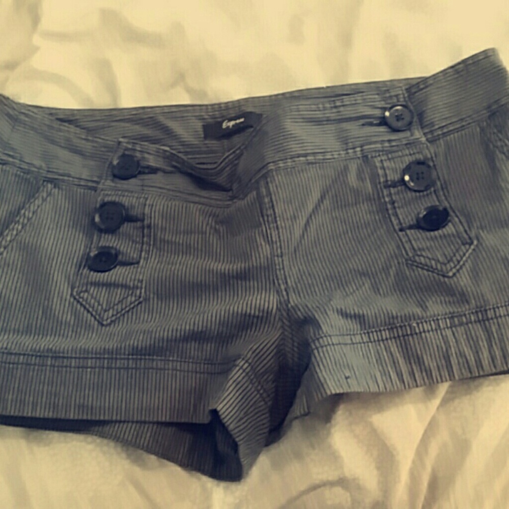 Black button up the sides short shorts.